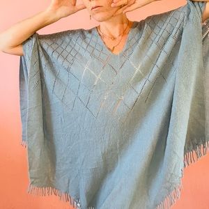 Sheer knitted blue shawl